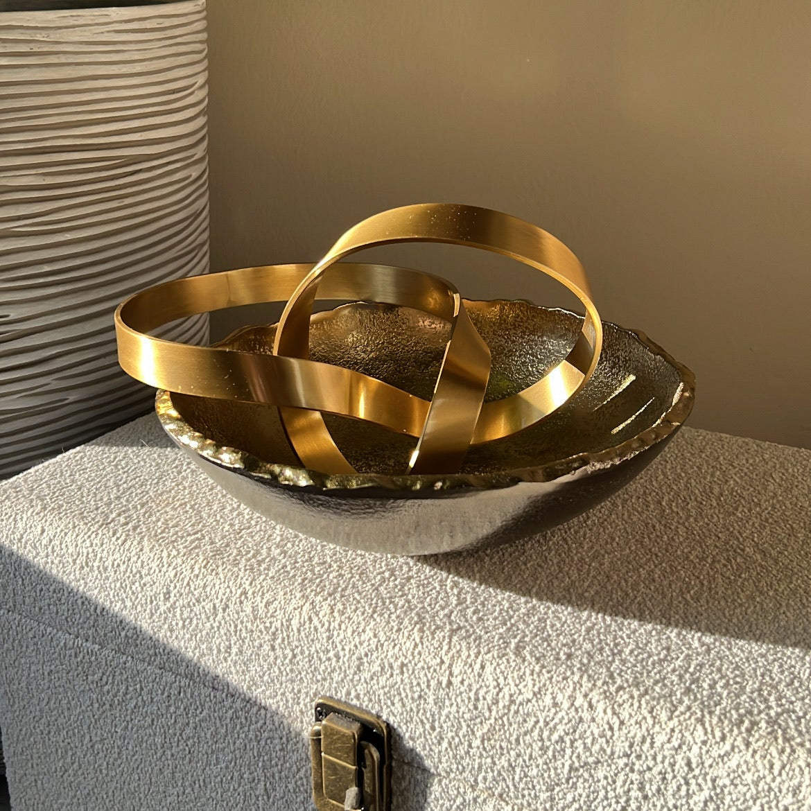Meraki gold Bowl displayed in neutral home