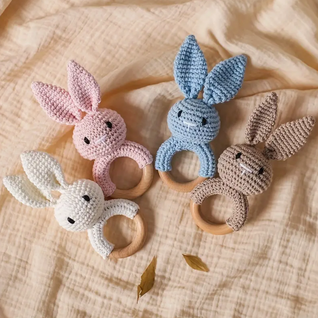 Crochet baby bunny rattle in brown, white pink and blue Petite Lumiere